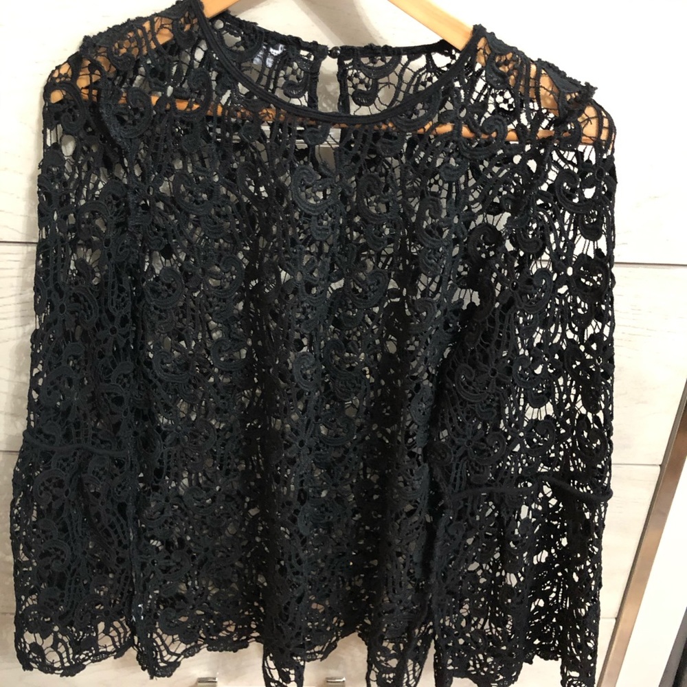Black Top by BEBÉ size Large.  Used once
